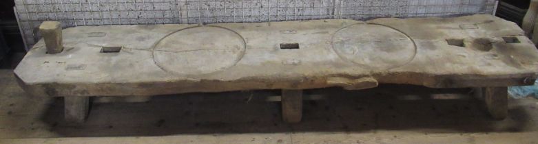 A pine low pig bench, 102ins x 22ins, height 13ins