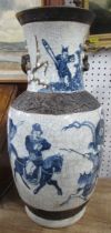 A Chinese vase, decorated in blue and white with warriors, af, height 18ins