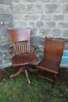 An Oak captain chair, together with a chair with a trouser press