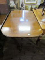A twin pedestal dining table with an extra leaf, length 56ins, width 33ins