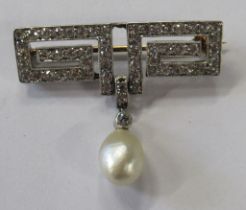 An early 20th century diamond and baroque pearl brooch, the double Greek key motif milgrain set with