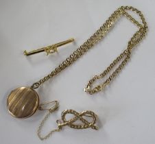 A 9ct Staffordshire knot Brooch, weight 5.5g, together with a circular locket on chain and a gilt