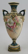 A Royal Worcester pedestal vase, the blush ivory body decorated with flowers, shape number 1732,