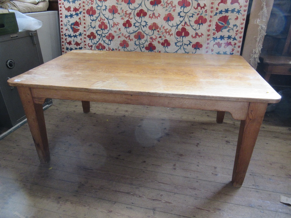 A pine kitchen table  41ins x 56ins, height 28ins