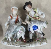 A Sitzendorf porcelain figure group, of a couple with sheep, height 6ins