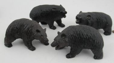 A group of four Black Forest carved wooden bears