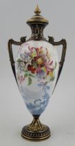 A Royal Worcester covered pedestal vase, decorated with flowers and a landscape in blue, shape