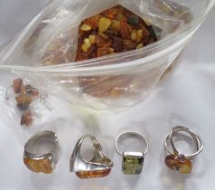 A collection of amber and rings etc