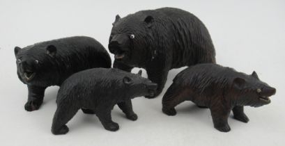 A group of four Black Forest carved wooden bears