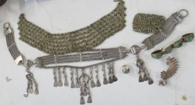 A collection of Eastern design jewellery, to include a gilt metal filigree bracelet, set four
