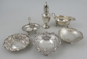A collection of hallmarked silver, to include sugar caster, sauce boat and dishes, weight 17oz