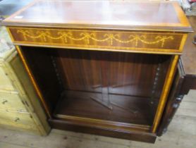 A reproduction set of book shelves, with cross banded decoration, width 33ins