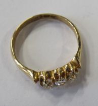 An 18ct three stone diamond ring, claw set three old-cut diamonds, total weight approximately 0.3ct
