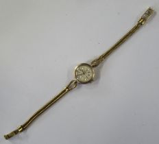 A 9ct gold cased Elco Incabloc wrist watch, with yellow metal double snake link bracelet and