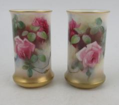 A pair of Royal Worcester cylindrical vases, decorated with roses, shape number 2510, height 4.