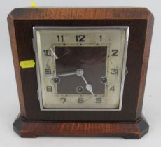An Art Deco style oak cased Mantel clock with 8 day striking movement
