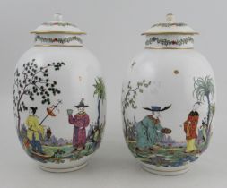 A pair of Meissen vases, with associated later covers, of ovoid form, painted on each side in the