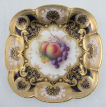 A Royal Worcester cabinet square plate, the centre decorated with fruit by Aryton, with a rich