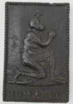 A Georgian Coalbrookdale cast iron Abolitionist Tobacco box lid, depicting a chained kneeling