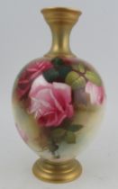 A Royal Worcester vase, decorated with roses by A Shuck, shape number 1846, height 11ins Condition