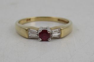 An 18ct gold ruby and diamond five stone ring, weight 2.9g, weight of 1 stone,  0.14ct, 4 stones