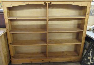 A pine set of shelves, width 67ins, depth 12ins, height 55ins