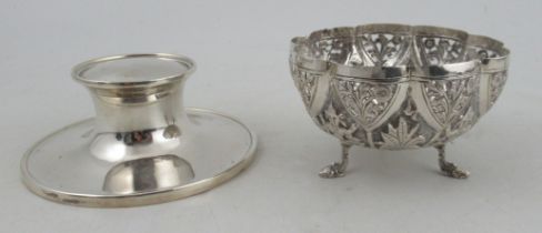 An Indian silver bowl, with pierced and embossed decoration, raised on three legs, weight 3oz,