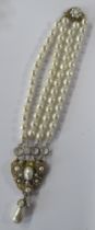 Miriam Haskell, a costume jewellery necklace with double faux pearl style bead rows, with gilt metal