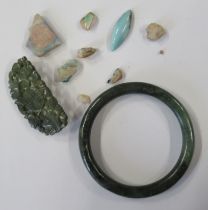 A Jadeite bangle, diameter 3ins, together with a jade type brooch and a quantity of boulder opal