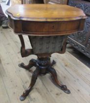 A 19th century rosewood work table, fitted with basket drawer, on carved base