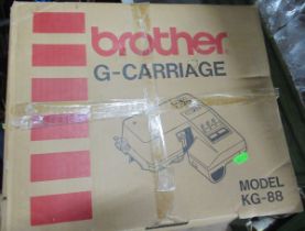 A boxed Brother embroidery machine