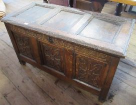 An Antique oak coffer, with carved decoration, width 44ins, depth 21ins, height 25ins