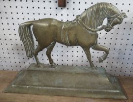A brass door stop, modelled as a horse, height 9.5ins