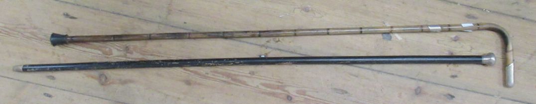 Two canes with silver mounts