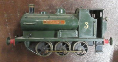 A tin plate clock work train