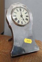 A silver mounted desk clock, with engraved inscription and modern movement, height 6.25ins