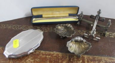 A Stirling silver compact, together with a propelling pencil, pair of silver salts and a pair of