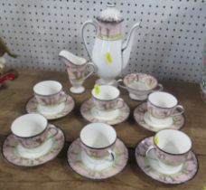 A Royal Doulton coffee set, decorated with trees to a pink sky