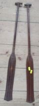 Two wooden tribal paddles, with carved decoration, length 28ins