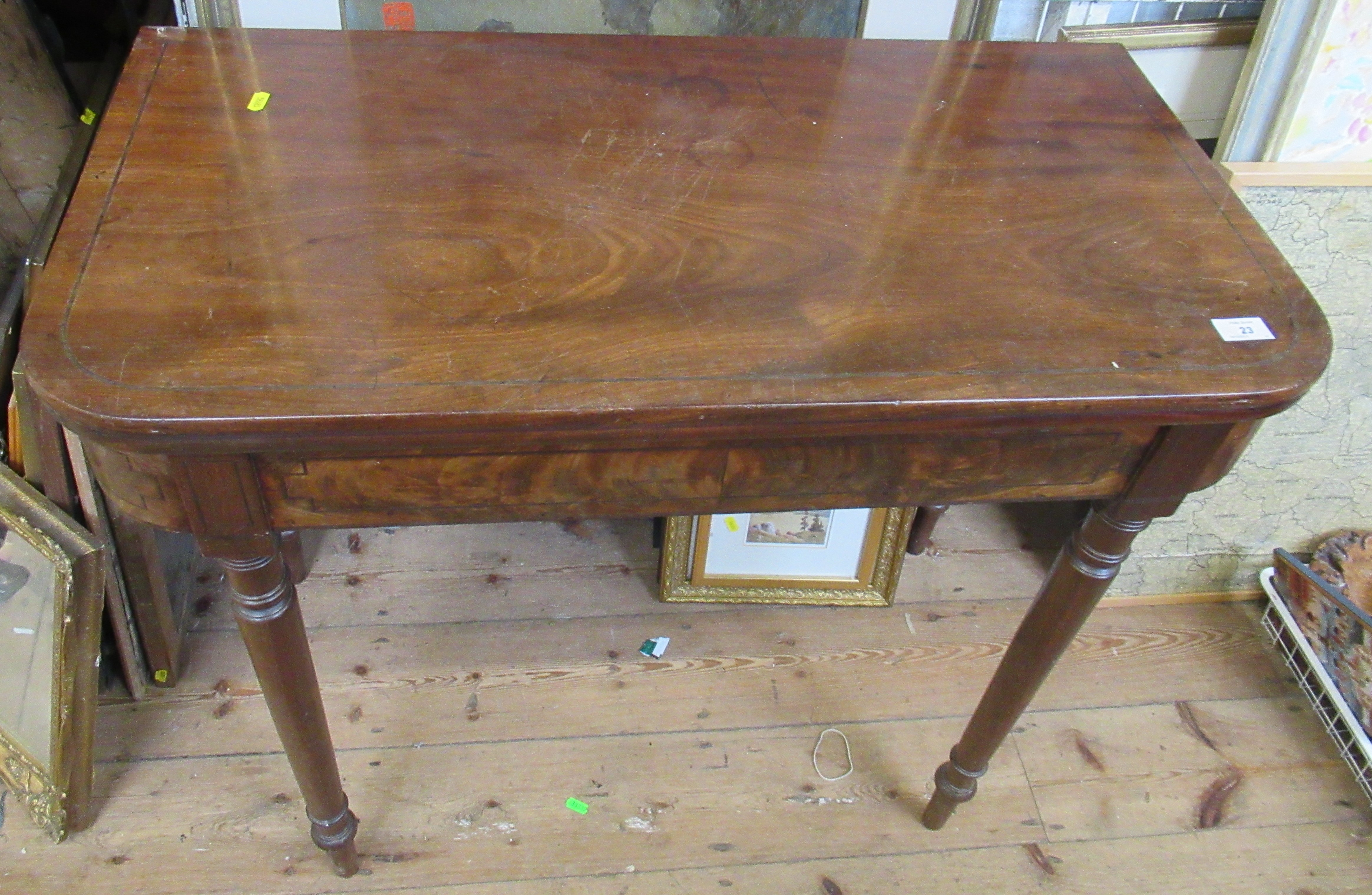 A 19th century mahogany card table, width 35ins, depth 19ins