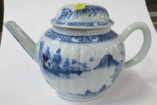 An 18th century Oriental tea pot, decorated in blue and white, af