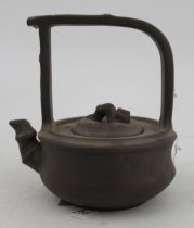 A Chinese yxing tea pot, height 4.5ins Condition Report: There is a chip to the inside of the lid.