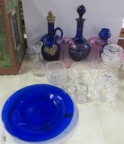 A collection of coloured and clear glass items, to include a pair of cranberry glass vases,