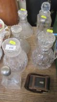 A collection of glass decanters, glass, opera glasses etc