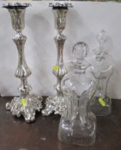 A pair of candlesticks, together with a pair of glug glug decanters