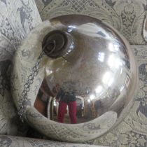 A large silvered witches ball bauble