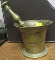 An Antique brass pestle and mortar