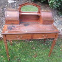 An Edwardian desk with cross banded decoration, width 36ins, height 41ins, depth 19ins