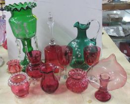 A collection of 19th century coloured glass, to include a green glass lustre with Mary Gregory style