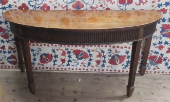 A 19th century mahogany D shaped side table, with fluted frieze and legs, 61.5ins x 22.75ins, height